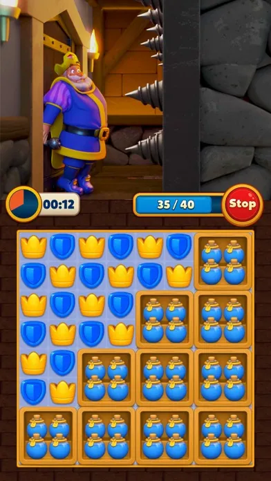 Tabuleiro colorido do jogo Royal Match com peças e obstáculos